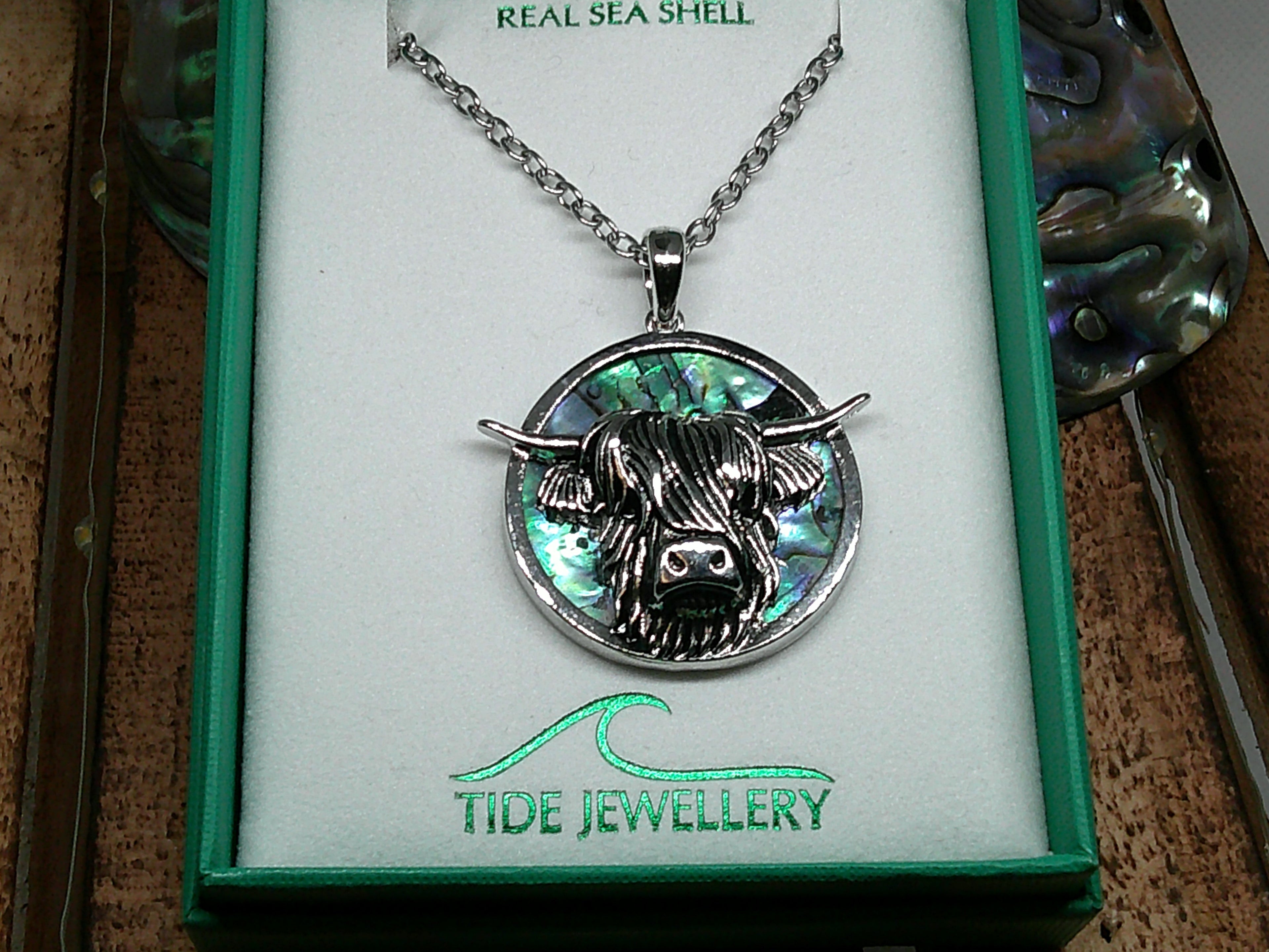 Paua shell west highland cow necklace