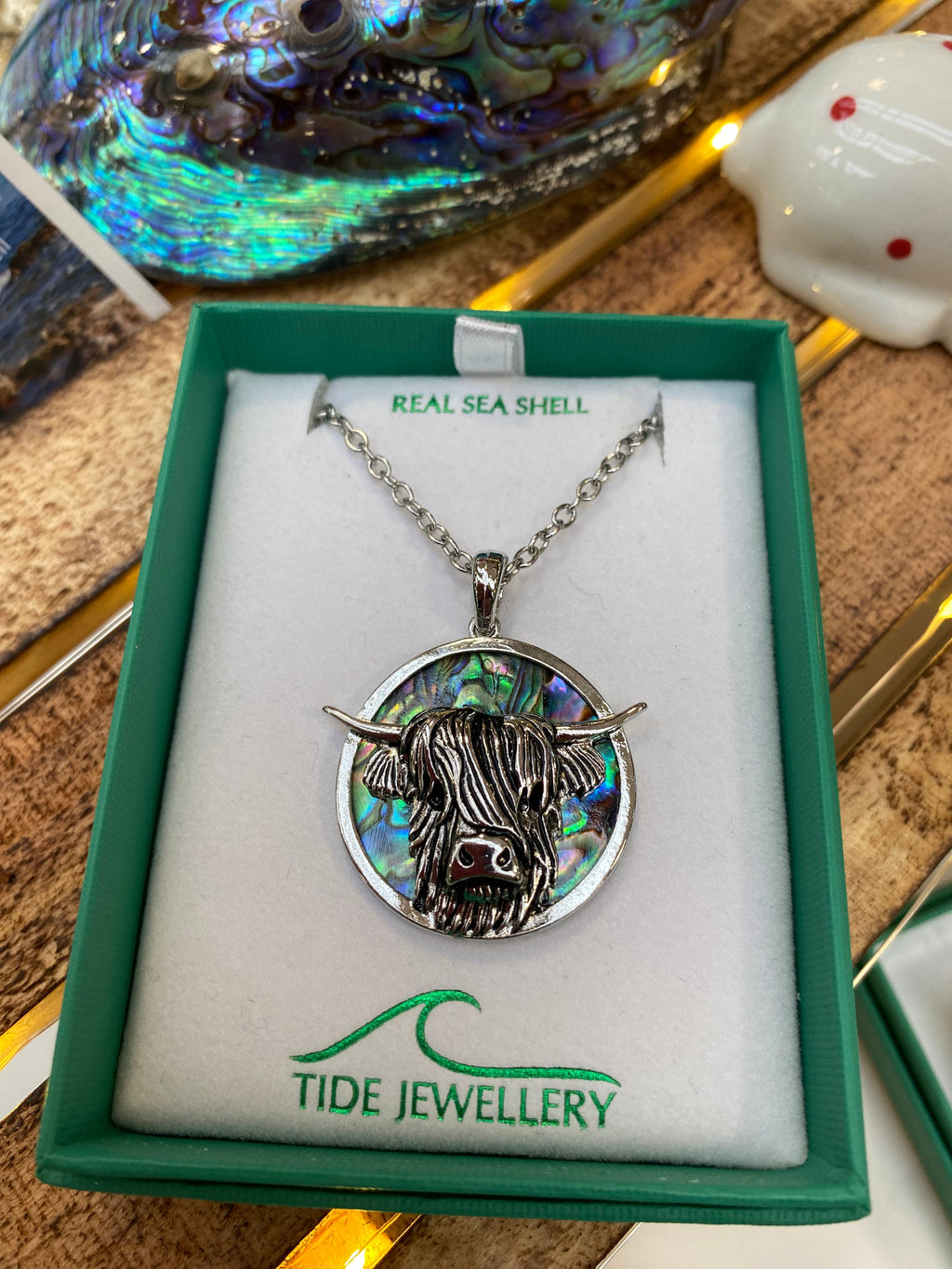 Paua shell west highland cow necklace