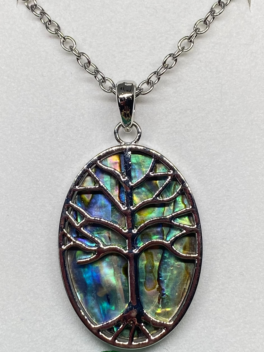 Paua shell oval tree of life necklace