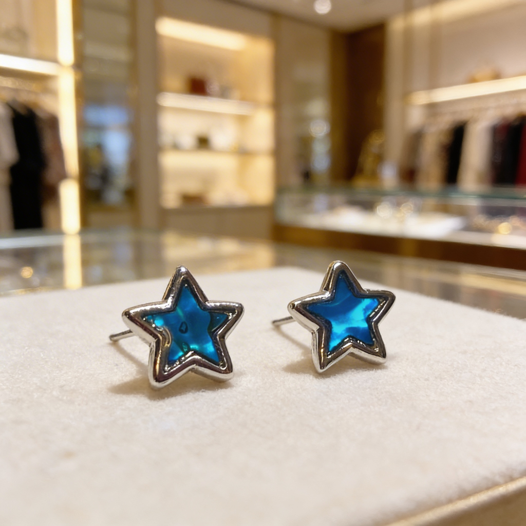 Paua shell blue star stud earrings