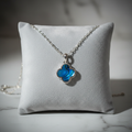 Blue Clover Necklace on Velvet