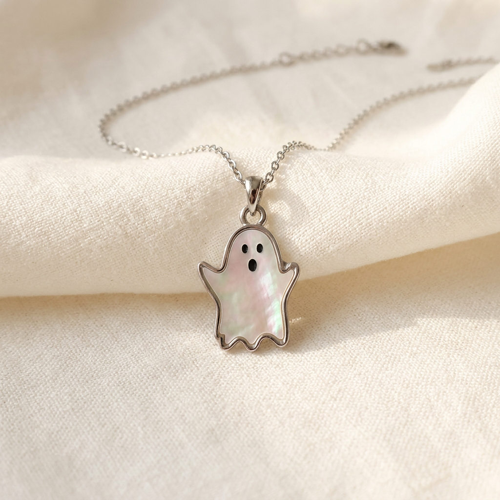 Ghost necklace styled on ivory linen